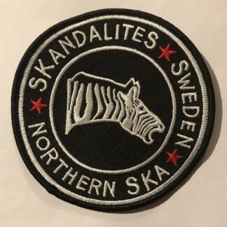 Skandalites - tygmärke